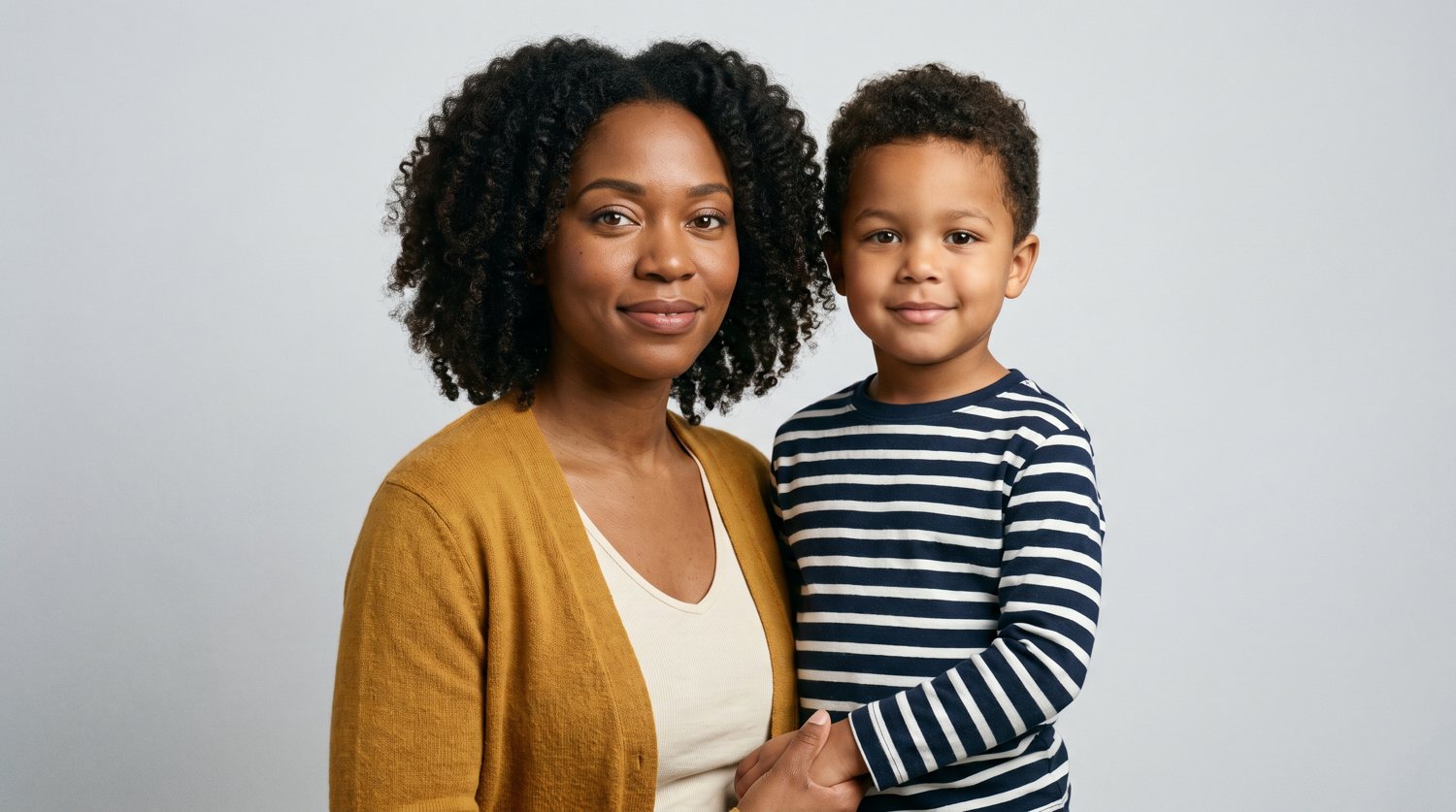 A mother and her young son, patients at Daystar Family Care